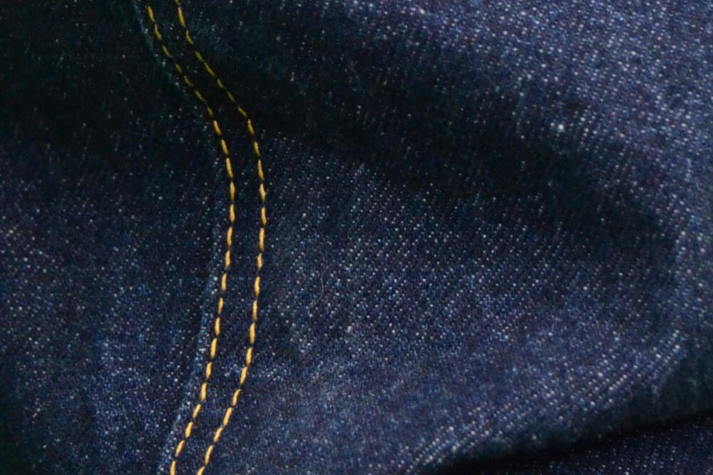 close up denim fabric with seam